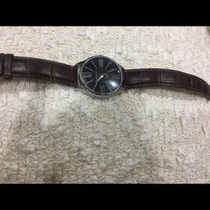 Yazole leather strap watch for men.